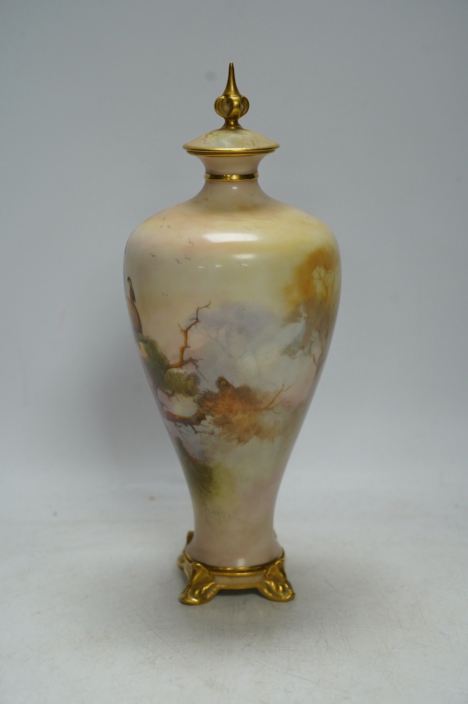 A Worcester vase and cover, painted with peacocks by J W Sedgley, model number 106, 25cm. Condition - good